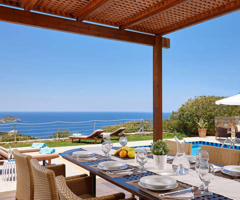 Okeanides Villas Crete Villa Dioni breakfast by the swimming pool with sea view