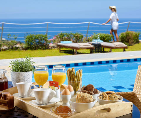 Okeanides Villas Crete Villa Pitho breakfast by the swimming pool with sea view