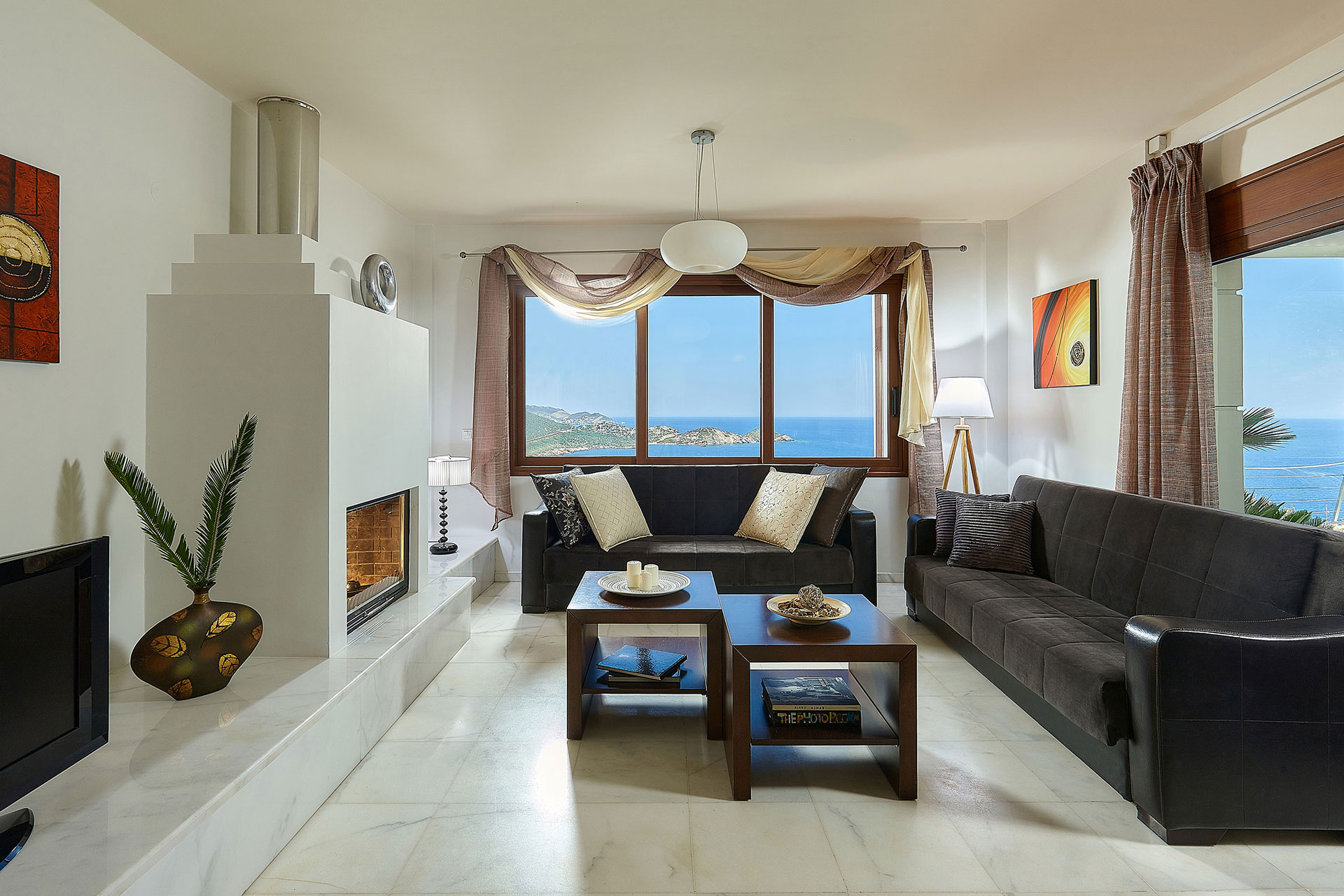Okeanides Villas Crete Villa Electra living room with fireplace