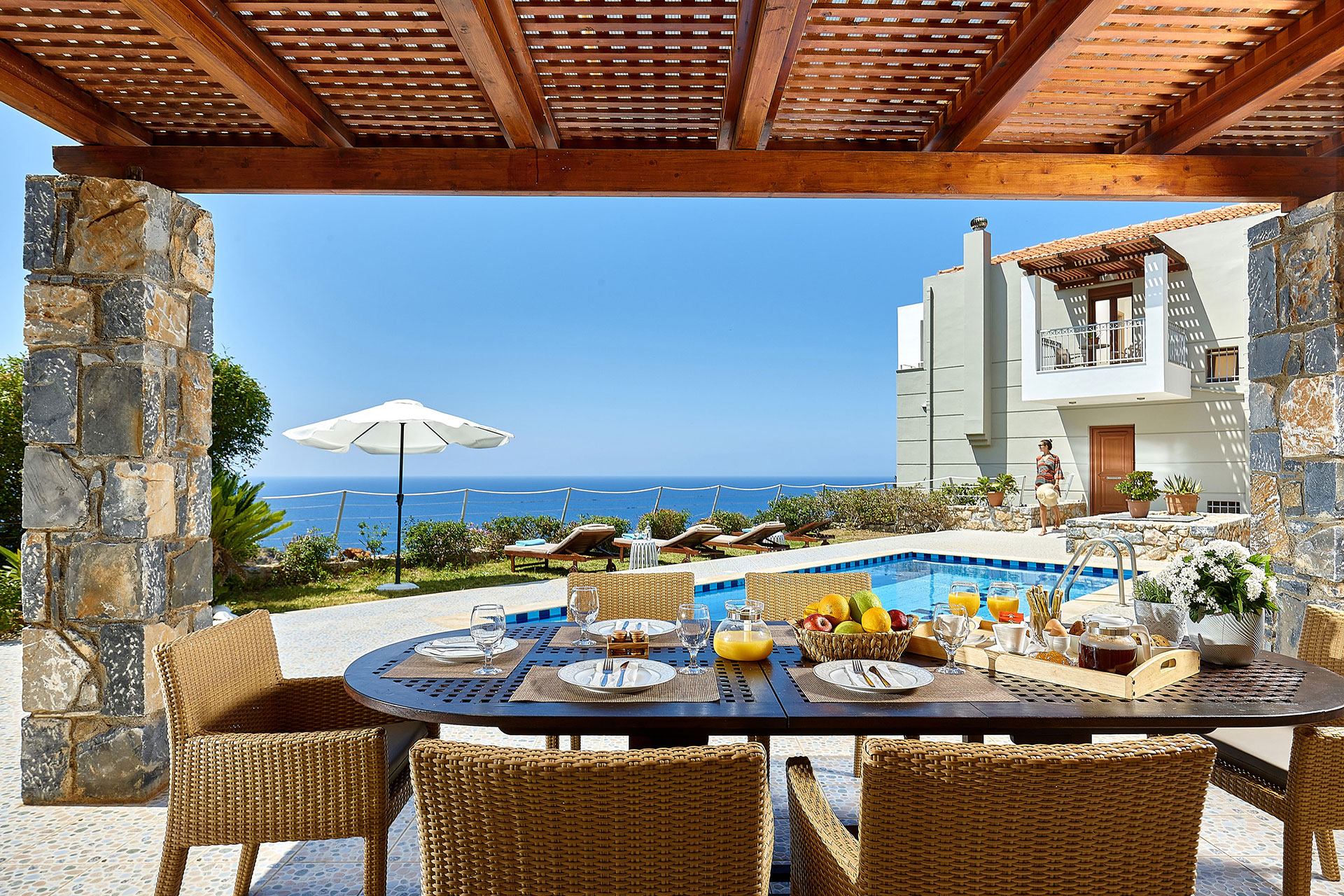 Okeanides Villas Crete Villa Pitho breakfast by the swimming pool with sea view